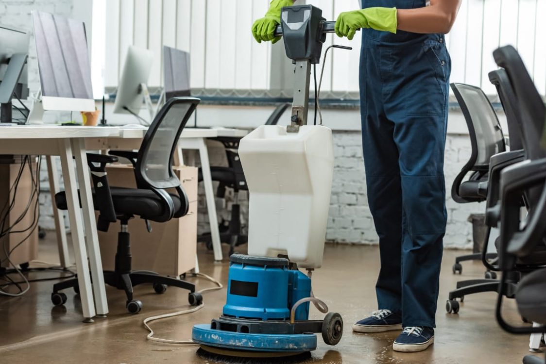 cropped-view-of-cleaner-washing-floor-in-office